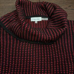 Calvin Klein Medium sweater.   Beautiful navy/red pattern